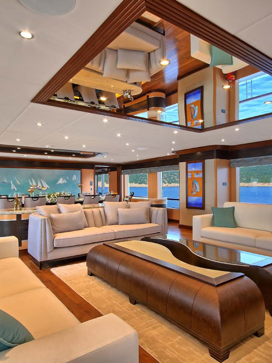 The main saloon in warm timber and deep seating