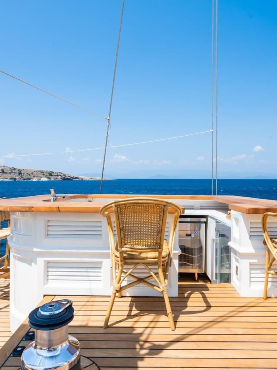 The foredeck, laid with seating for the afternoon