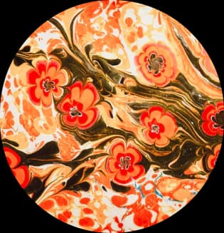 Traditional Turkish ebru marbling with red floral motifs