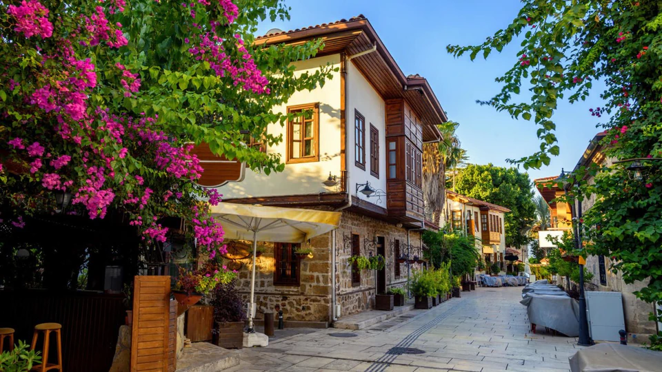 A bougainvillea-draped lane of restored Ottoman houses in Kaleiçi, Antalya's old town